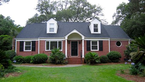 brick ranch houses with dark red metal roofs|brick house metal roof colors.